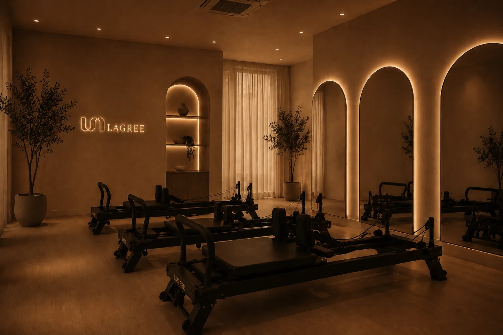 The LSN Lagree studio floor in Mumbai, five spring-loaded machines lit low and warm